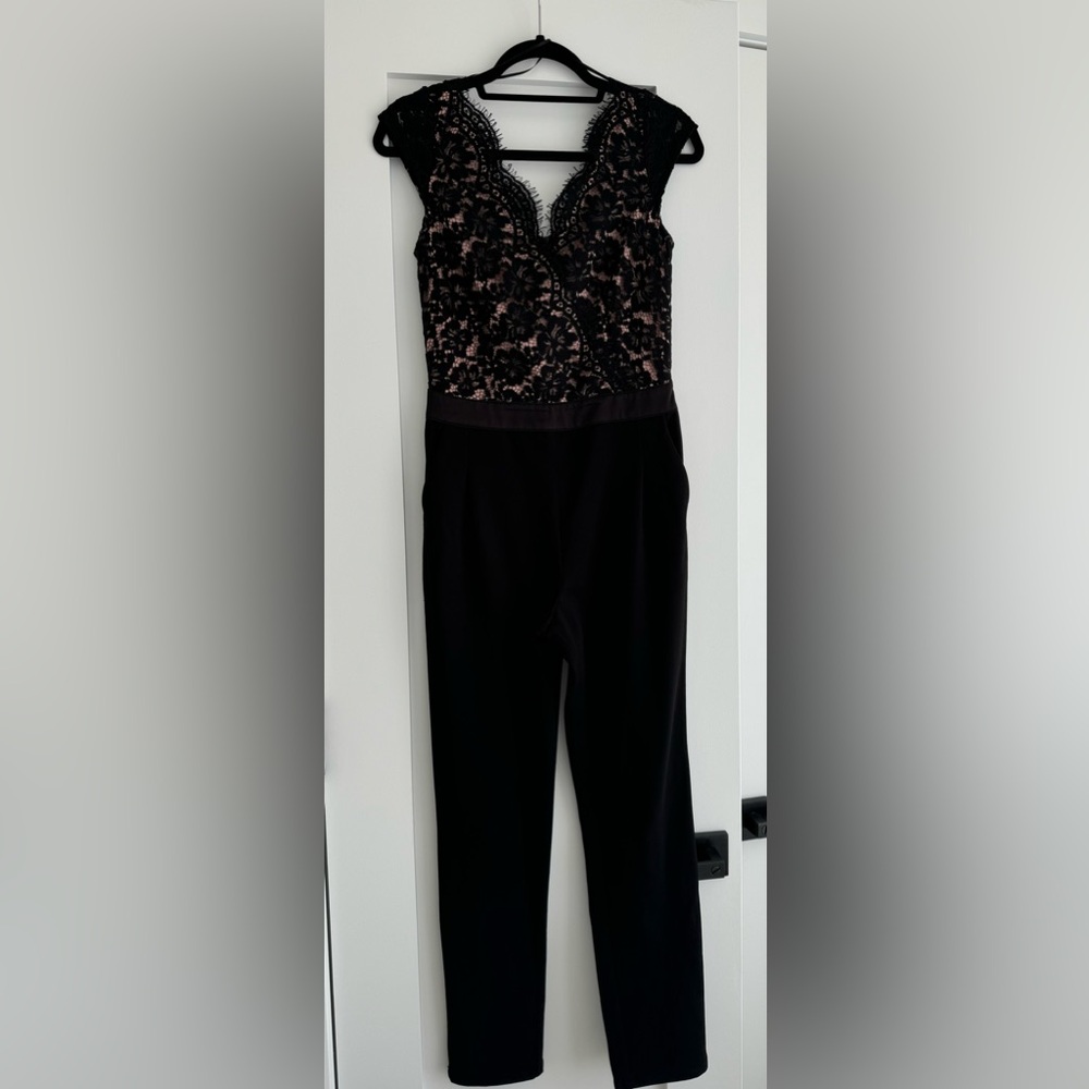 Black Overall for women. Size EUR 34, IT 38.